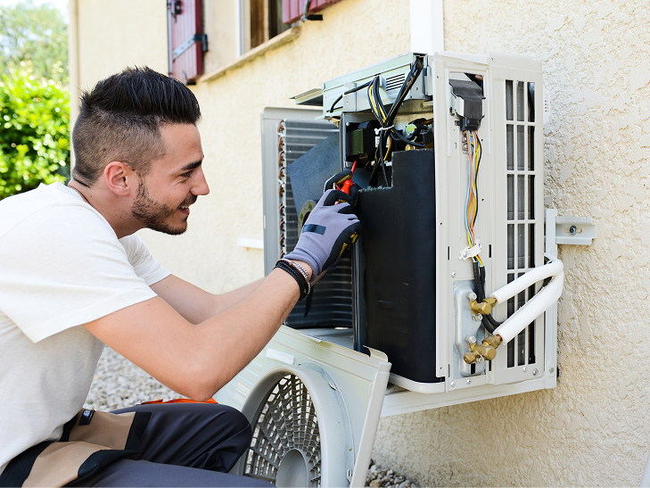 contractor-repairing-exterior-hvac-system